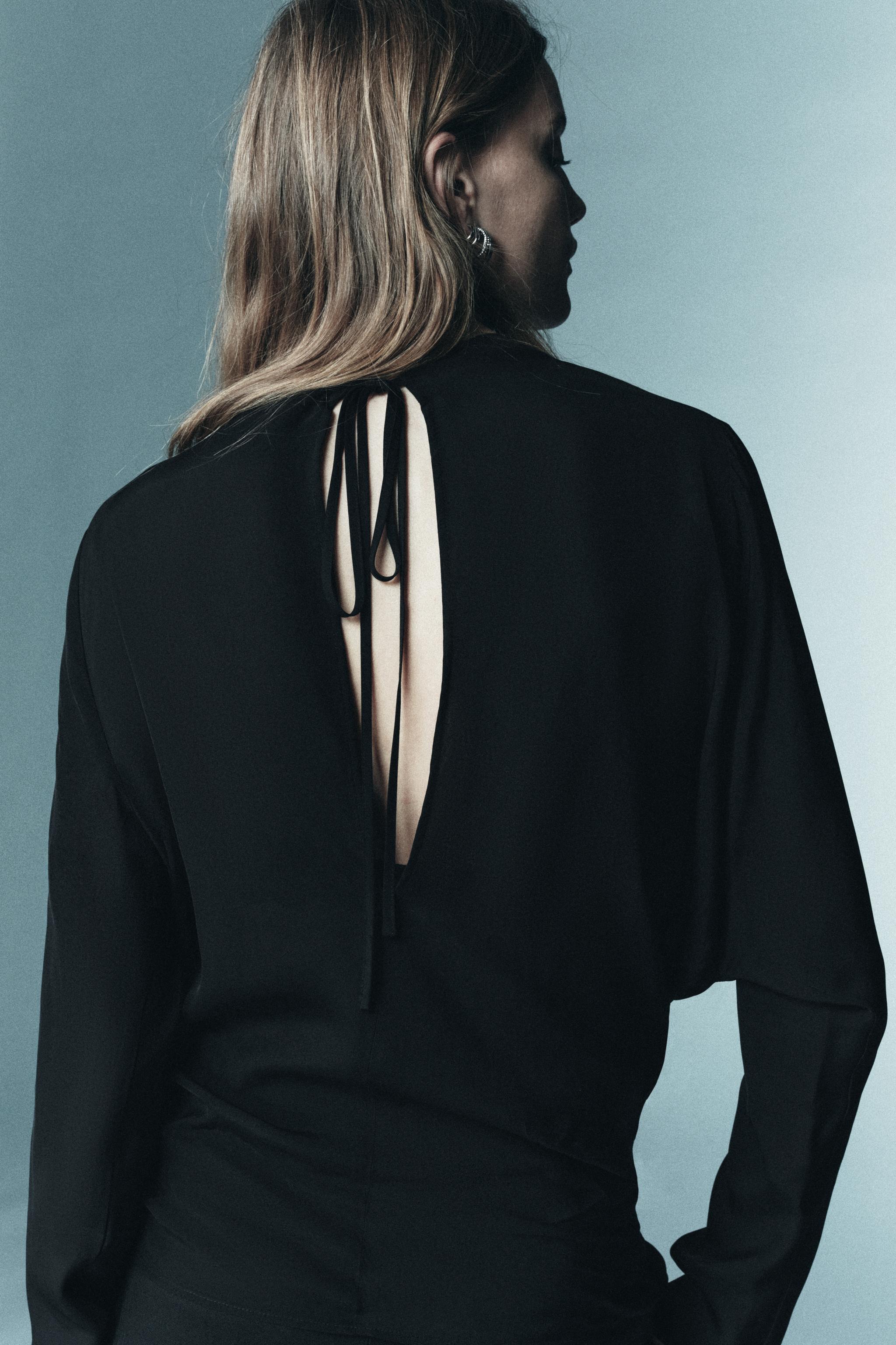 LIMITED EDITION DRAPED BLOUSE